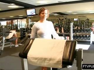 Teen flashing big tits at the gym